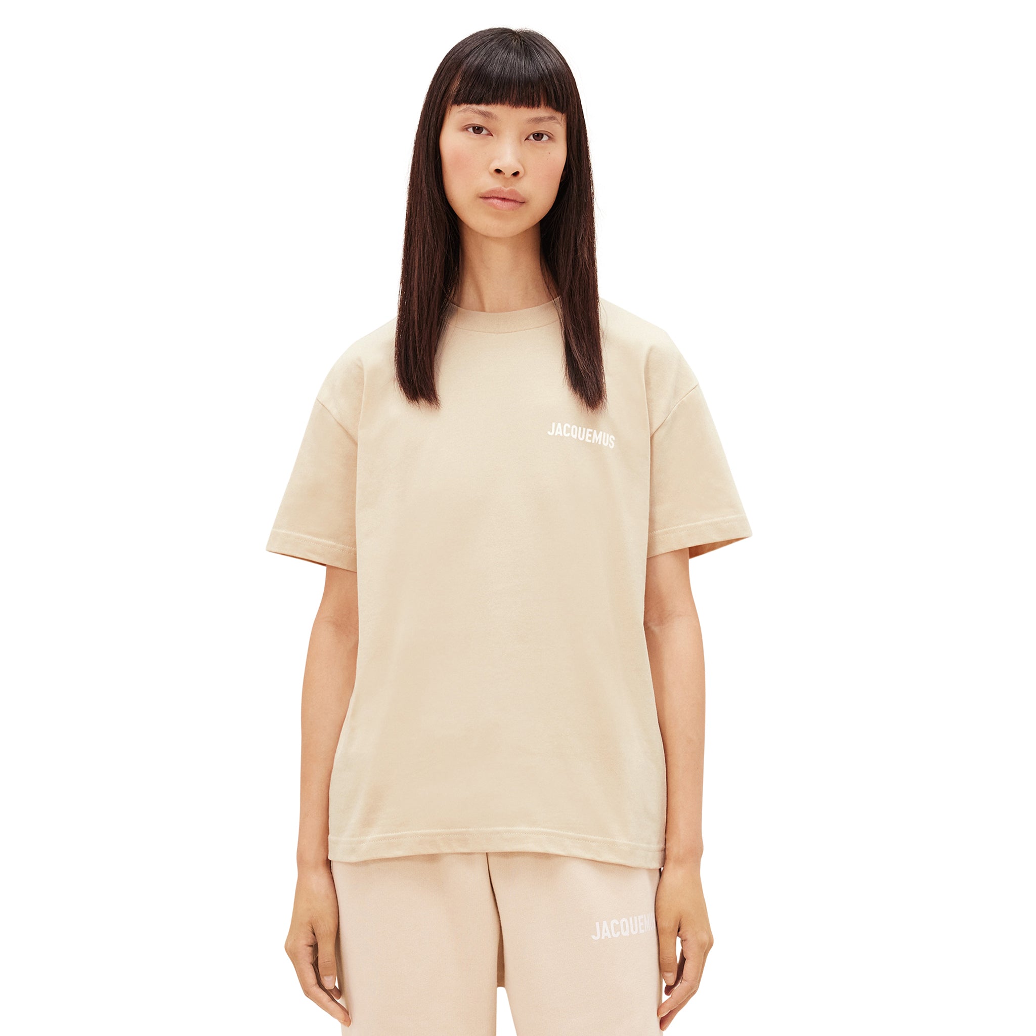 Female model front view of Jacquemus Logo T Shirt Light Beige 216JS207-2480-130